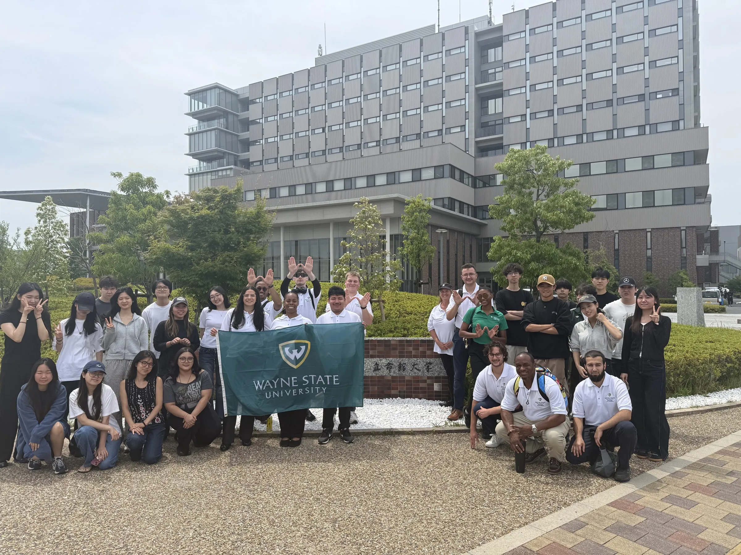 Wayne State and Japanese university students together after their academic exchange in Osaka.